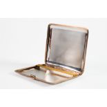 GEORGE VI ENGINE TURNED SILVER POCKET CIGARETTE CASE, with silver gilt edging and press opener, 4” x