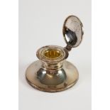 FILLED SILVER CAPSTAN INKWELL, with clear glass liner, 2” (5.1cm) high, 3 ½” (9cm) diameter,