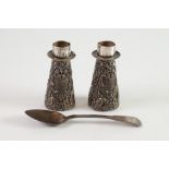 PROBABLY WILLIAM COMYNS PAIR OF LATE VICTORIAN EMBOSSED SILVER CONICAL FORM CANDLESTICK INSERTS