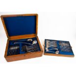 EDWARDIAN BLOND OAK CASED 46 PIECE SET OF ELECTRO-PLATED CUTLERY, the top inset with a brass