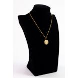 9ct GOLD TWISTED FINE CHAIN NECKLACE with ring clasp and the circular locket pendant with gold