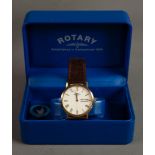 GENT'S ROTARY QUARTZ GOLD-PLATED WRIST WATCH with white roman dial with day, date aperture;