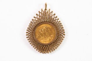 QUEEN ELIZABETH II 1974 GOLD SOVEREIGN in 9ct gold broad pierced frame as a PENDANT, 14gms gross