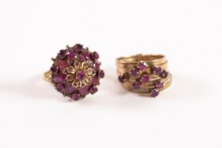 FIVE HOOP GOLD COLOURED METAL RING, crown set with nine rubies, 5gms (marked 14k), ring size N and a