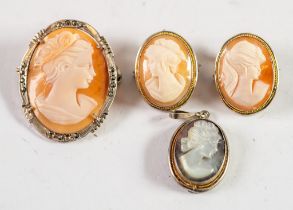 THREE CONTINENTAL SHELL CARVED CAMEO BROOCH PENDANTS and another carved mother of pearl CAMEO, in