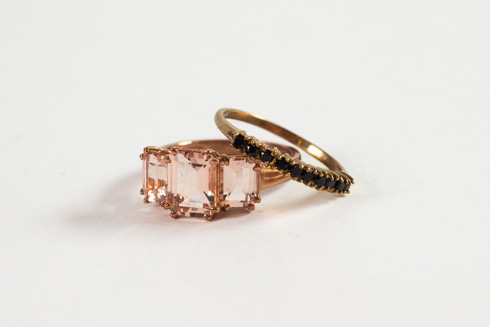 9ct GOLD RING set with three emerald cut morganite stones and 9ct GOLD RING set with a row of ten