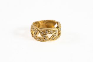 14ct GOLD BROAD RING, the open work top forming seven inverted triangles, set with tiny white