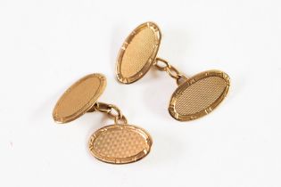PAIR OF 9ct GOLD DOUBLE OVAL CUFFLINKS, finely engine turned with raised borders, Birmingham 1914,