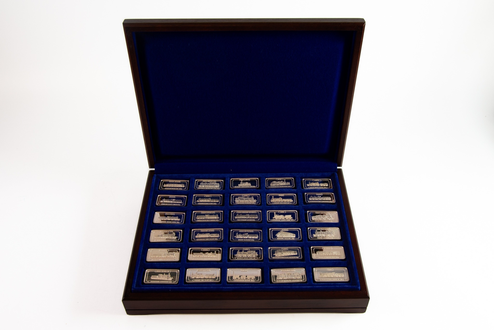 CASED SET OF THIRTY 1ozt INGOTS OF HALLMARKED SILVER ISSUED BY THE BIRMINGHAM MINT TO COMMEMORATE