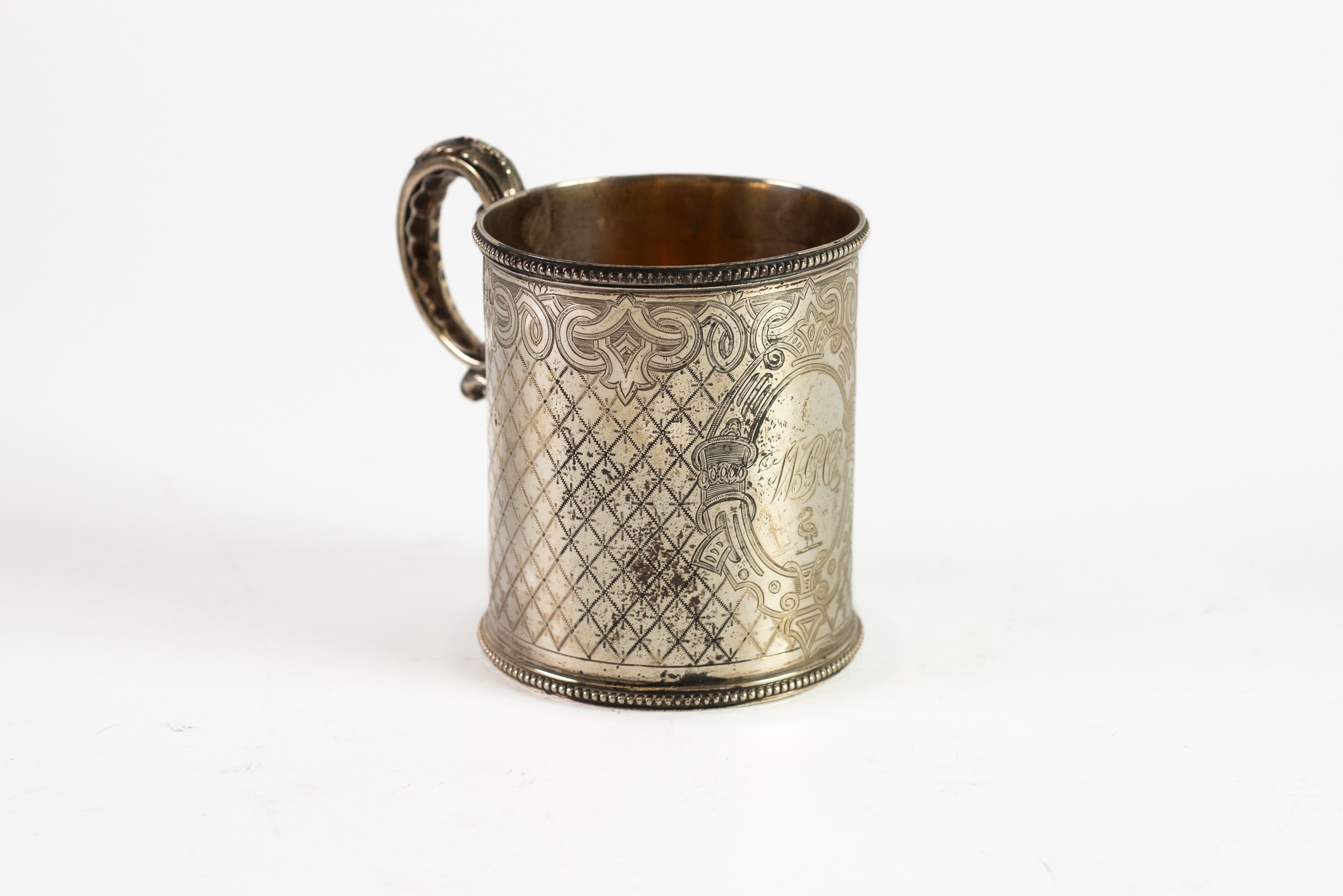 VICTORIAN ENGRAVED SILVER CHRISTENING MUG BY MARTIN, HALL & Co, with fancy double scroll handle