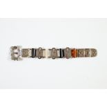 VICTORIAN SILVER AND BANDED AGATE BUCKLE BRACELET, five foliate scroll engraved curved and pierced