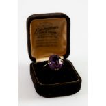 9ct GOLD OVAL AMETHYST SET DRESS RING, 3.4 gms gross