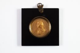 ‘ADMIRAL LORD NELSON’ EMBOSSED GILT METAL PORTRAIT PLAQUE, 2 ¼” (5.7cm) diameter, in a square,