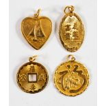 FOUR CHINESE GOLD EMBOSSED PENDANTS, one in the form of a coin with centre square hole; one heart