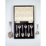 A CASED SET OF SIX PROBABLY AMERICAN 'STERLING' SILVER TEASPOONS with floral stamped handles; also a