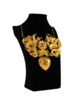 CHINESE GOLD WEDDING NECKLACE, in four parts with chain back, the large embossed front in the form