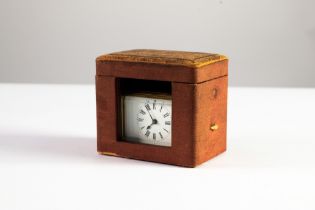 EARLY TWENTIETH CENTURY BRASS SMALL CARRIAGE CLOCK IN ASSOCIATED RED CLOTH TRAVELLING CASE,