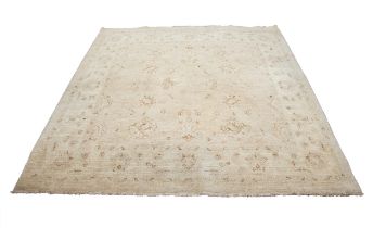 EASTERN SMALL SQUARE BORDERED CARPET, fawn field with pale cream circular centre medallion and