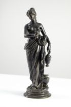 DARK PATINATED BRONZE FIGURE OF HEBE, modelled with jug and cup, on a moulded circular base,