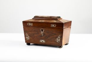 REGENCY ROSEWOOD VENEERED TEA CADDY, sarcophagus shaped, with mother-of-pearl inlay to the lid and