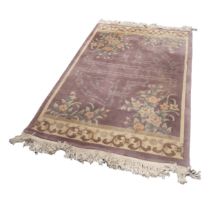 KAYAM WASHED CHINESE HAND-MADE ALL-WOOL PILE RUG with mauve field having large naturalistic