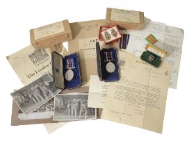 Two Civil Defence Long Service Medals and ephemera