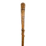 A late Victorian holly walking cane