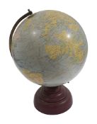 An 11" terrestrial globe. The Paramount by Geographia of Fleet Street c.1950