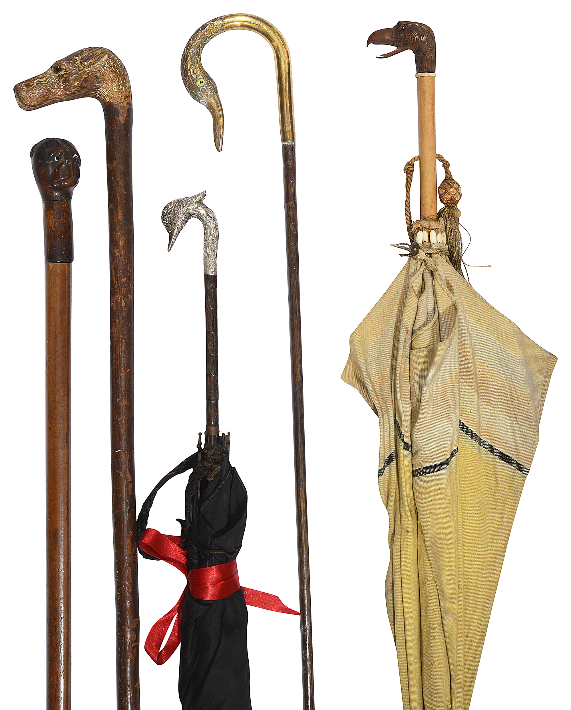 Five late Victorian / Edwardian novelty walking sticks and parasols