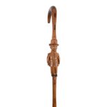 An early 20th century tribal carved walking stick