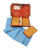 An early 20th century leather cased set of Mah-Jong c.1930