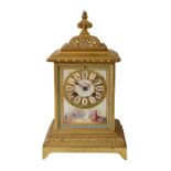 A late 19th century French ormolu and Sevres style porcelain mantle clock