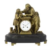 A late 19th century French Ormolu and black marble mantle clock
