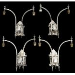 A set of four Edwardian silvered brass two branch wall lights c.1900