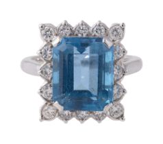 A blue topaz and diamond-set ring