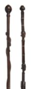 Two African carved hardwood tribal walking canes