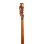 A late Victorian novelty Mr Punch carved walking cane c.1900