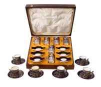 An Edwardian set mounted silver mounted Staffordshire coffee set for 12