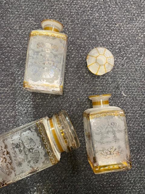 A set of late 19th century Bohemian amber flashed glass toilet bottles - Image 2 of 2