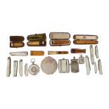 A collection of cheroot holders, silver folding fruit knives and other items