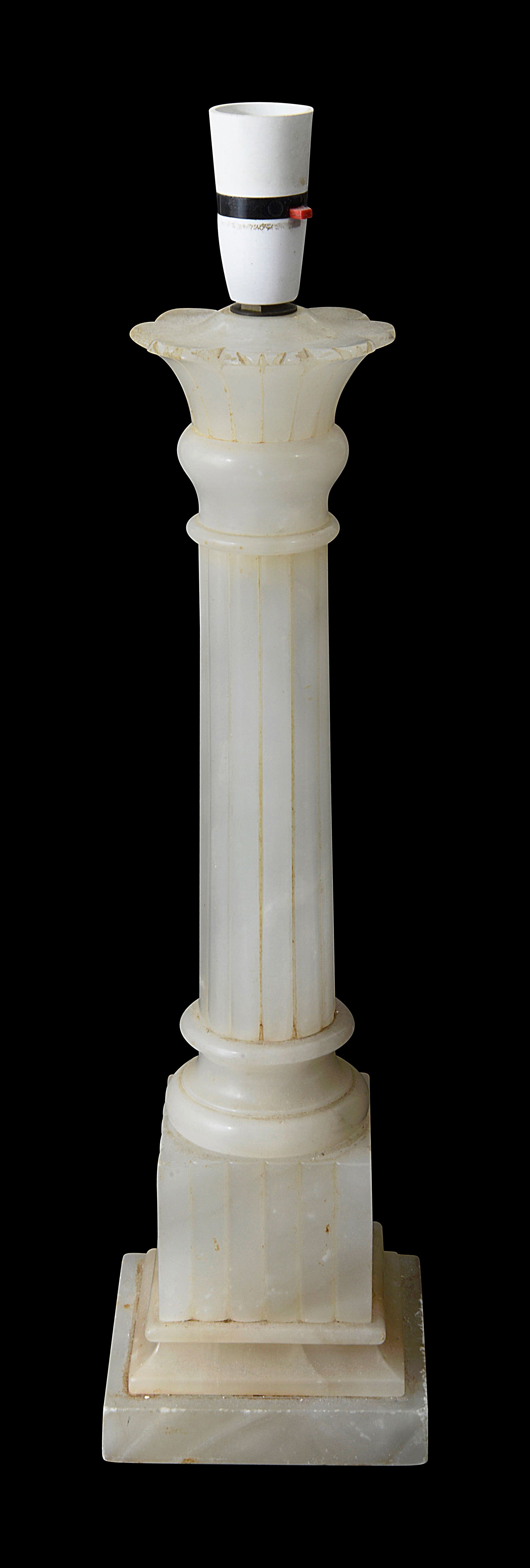 A tall alabaster column form fluted table lamp base