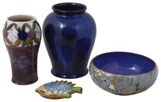 Four pieces of Royal Doulton stoneware