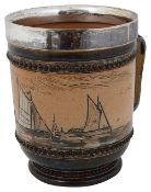 A Doulton Lambeth stoneware mug