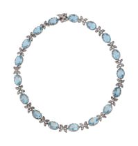 An attractive light blue paste necklace