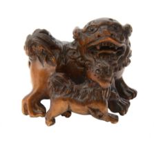 A Japanese Meiji period carved boxwood netsuke