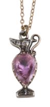 A georgian pink topaz and diamond charm in the form of an urn