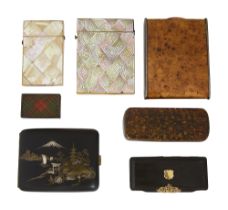 A collection of 19th century snuff boxes and card cases