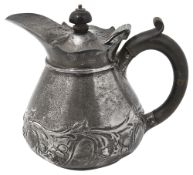 An Edwardian silver small hot water jug