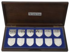 The Royal Arms, a set of twelve silver shield shaped ingots