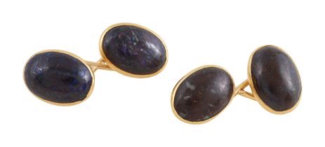 A pair of black opal cufflinks
